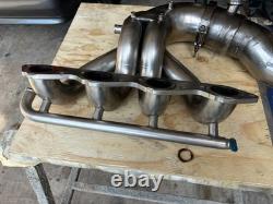 Stainless steel Mercruiser 525 marine racing header starboard said