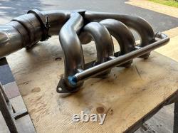 Stainless steel Mercruiser 525 marine racing header starboard said